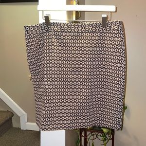 A Cute skirt that can be paired with some nice black boots and a turtleneck.